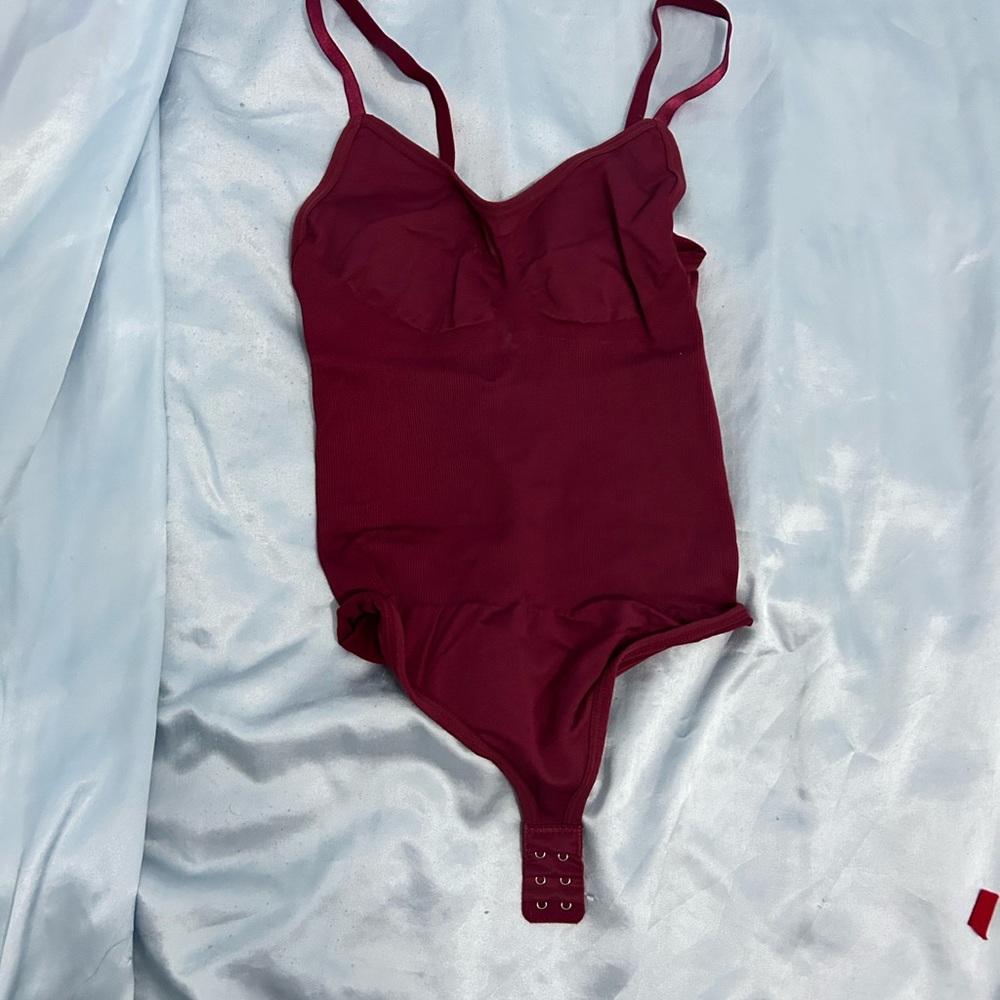 Vibrant Red Bodysuit with Spaghetti Straps and High-Cut Legs